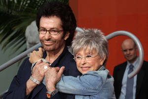 George Chakiris Rita Moreno Happy Hug Wallpaper