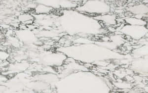 Get A Sleek And Stylish Look With This Timeless Marble Macbook Wallpaper