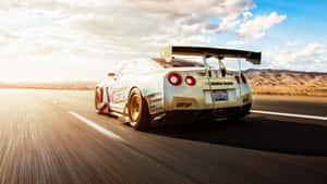 Get Ready For A Revolutionized Ride With Gtr R35 Wallpaper