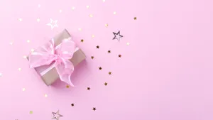 Gift Box With Baby Pink Ribbon Wallpaper