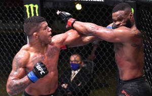 Gilbert Burns Punches Tyron Woodley Wallpaper