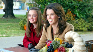 Gilmore Girls In Town Plaza Wallpaper