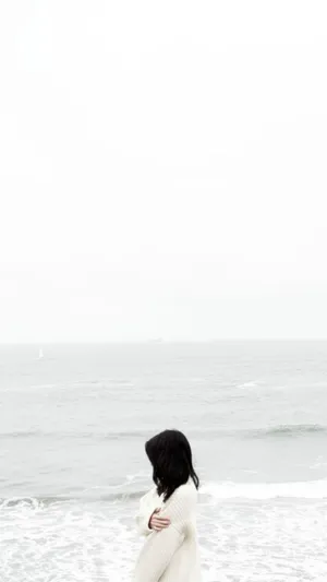 Girl Aesthetic On The Beach Wallpaper