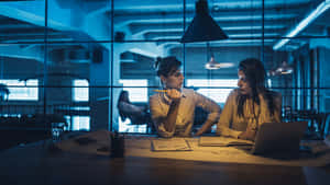 Girls Working In Dark Room Wallpaper