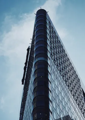 Glass Building With Sharp Edge Wallpaper