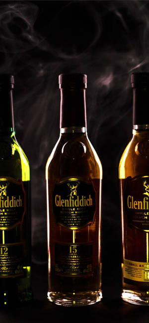 Glenfiddich Whiskies In Dim Lighting Wallpaper