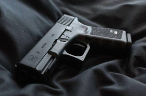 Glock 19 On Black Cloth Wallpaper