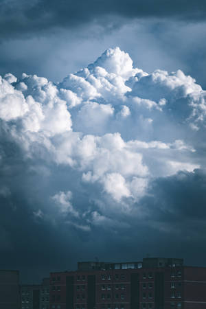 Gloomy Weather Cloudy Sky With Buildings Wallpaper