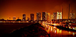 Glowing Night City Reflection Wallpaper