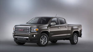 Gmc Car In Grayish A Setting Wallpaper