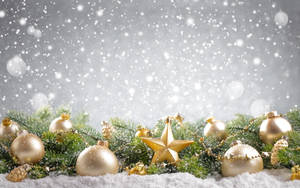 Gold Christmas Balls With Winter Snow Wallpaper