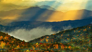 Golden Sunrise Over Smoky Mountains Wallpaper