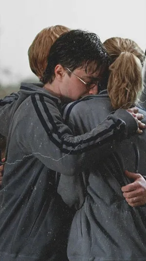 Golden Trio Hugging Phone Wallpaper