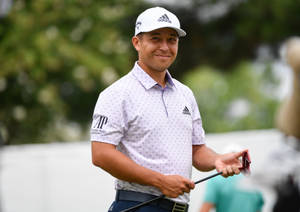 Golfer Xander Schauffele Smiling Wallpaper