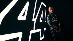 Grace And Speed - Lewis Hamilton With Car Number 44 Wallpaper