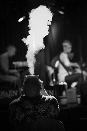 Grayscale Photo Of Man Smoking Blunt Wallpaper