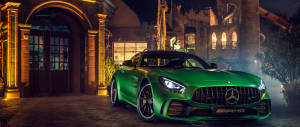 Green Amg Parked Outside The Door Wallpaper