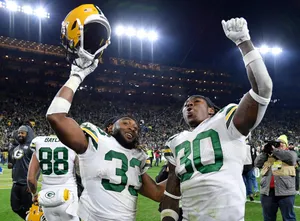 Green Bay Packers Running Back Aaron Jones Aiming For The End Zone. Wallpaper