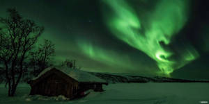 Green Sky With A Cabin Wallpaper