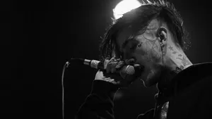 Greyscale Lil Peep On Stage Wallpaper