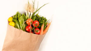 Grocery Items Tomatoes And Carrots Wallpaper