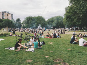 Group Of People At The Park Wallpaper