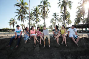 Group Of People On The Beach Wallpaper