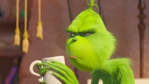 Grumpy Grinch With Coffee Wallpaper