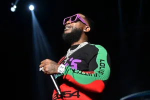 Gucci Mane Performingon Stage Wallpaper