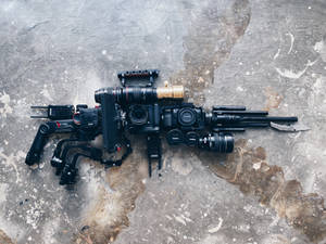 Gun-looking Camera Wallpaper