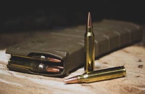 Gun Magazine And Bullets Wallpaper