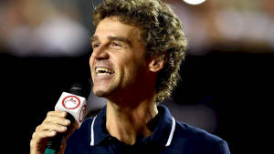 Gustavo Kuerten With A Microphone Wallpaper