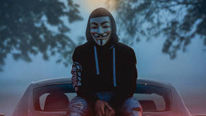 Guy Fawkes Mask On Car Trunk Wallpaper
