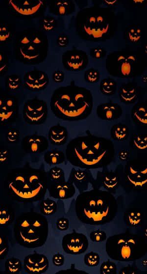 Halloween Pumpkins On A Dark Background Wallpaper
