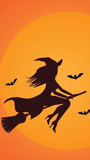 Halloween Witch In Orange Background Wallpaper