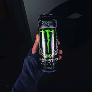 Hand Holding Monster Energy Can Wallpaper