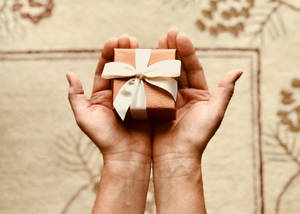 Hands Gift Box Wallpaper