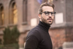 Handsome Man Turtleneck Glasses Wallpaper