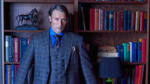 Hannibal By The Bookshelf Wallpaper