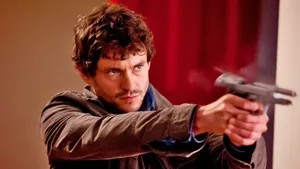 Hannibal Will Shooting A Gun Wallpaper