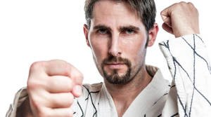 Hapkido Martial Artist In Battle Stance Wallpaper