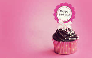 Happy Birthday Cupcakewith Topper Wallpaper