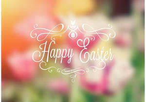Happy Easter Calligraphy Over Blurry Flowers Wallpaper