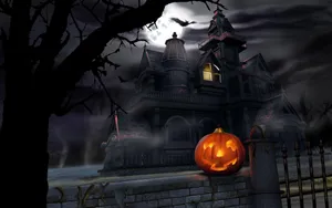 Haunted House With Glowing Pumpkin Wallpaper