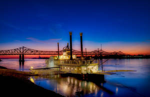 Having Fun On A Casino Boat Along Mississippi River Wallpaper