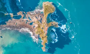 Hd Desktop Waves On Boulders Wallpaper