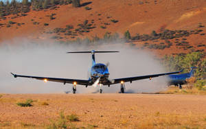 Hd Plane Landing In Desert Wallpaper