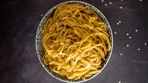 Hibachi Fried Noodles With Sesame Seeds Wallpaper