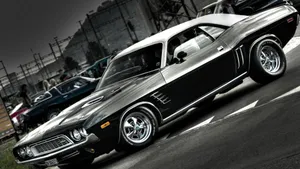 High Performance And Style – Old School Muscle Cars Wallpaper