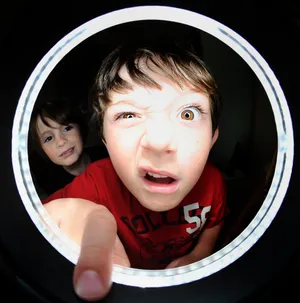 Hilarious Face Of A Child Wallpaper